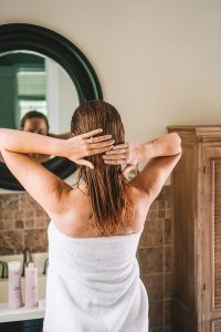 applying the ultimate hair and root revival system